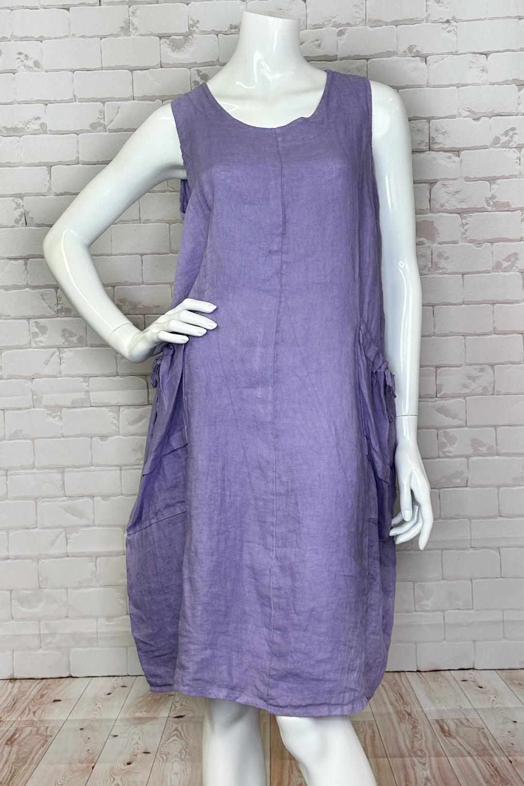 CHERISHH Spring 2024 Featuring fabulous spring colours, this linen dress will keep you looking light and right! With convenient front tie patch pockets, this simple and classic dress is a must-have in any wardrobe for the warmer months.