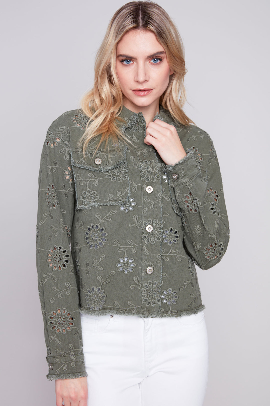 Featuring a stunning embroidered eyelet design, this jean jacket exudes sophistication and fun! 