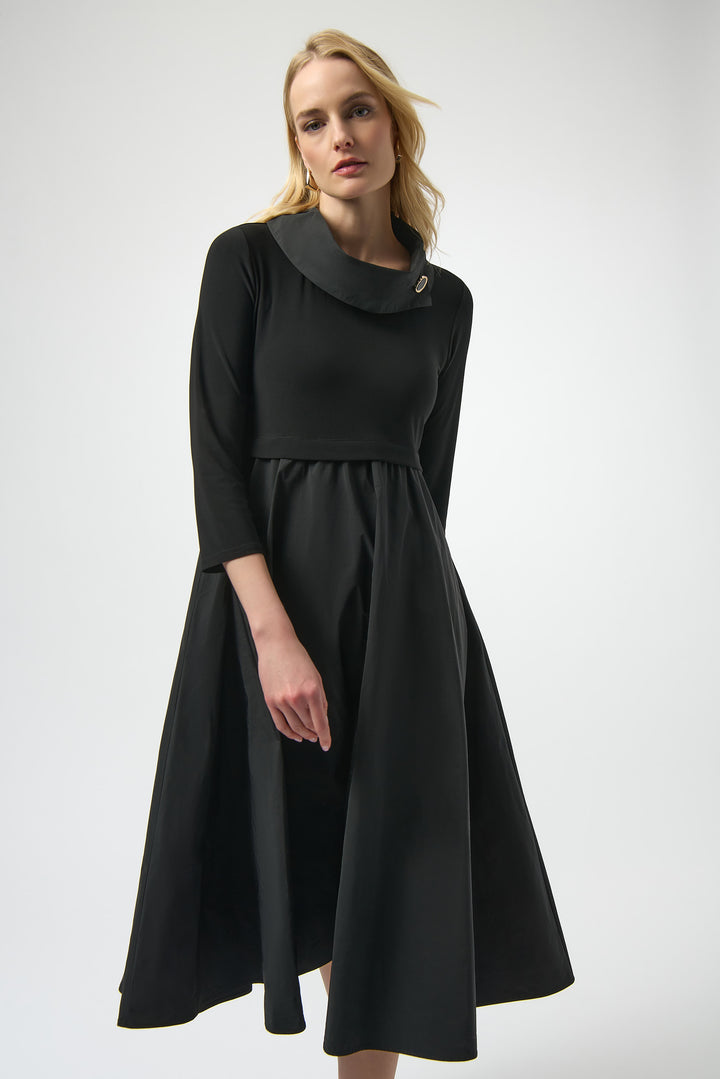Joseph Ribkoff Fall 2025 
ts flattering midi length and A-line silhouette create elegant movement, while the unique memory cowl neck adds a sophisticated touch.