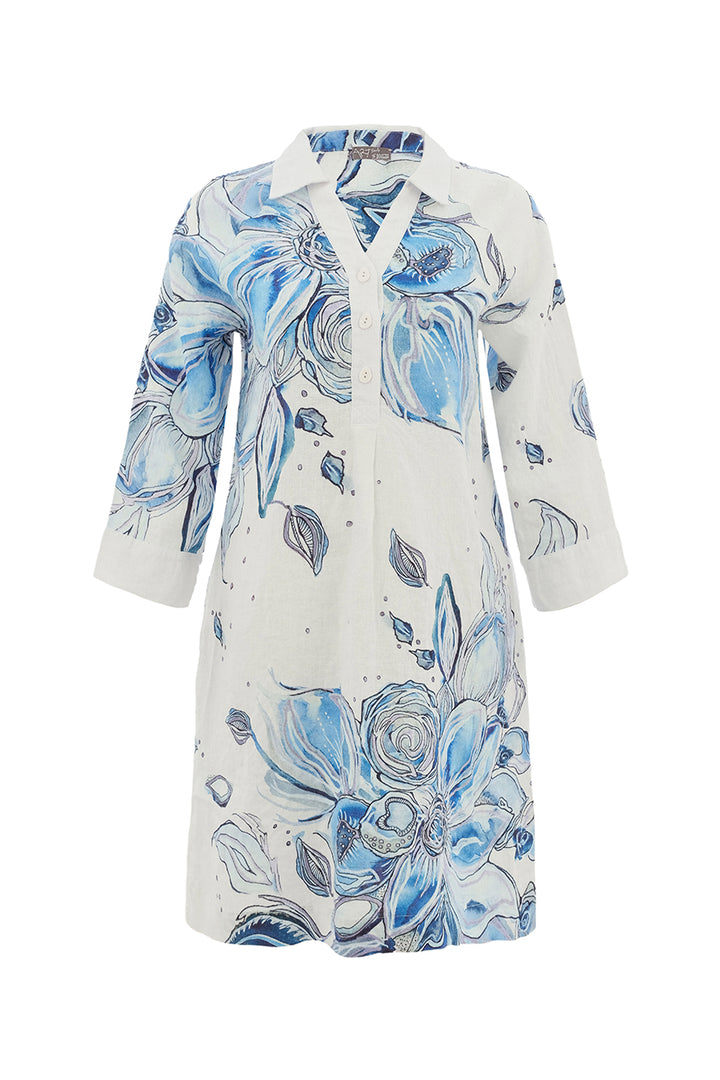 White shirt dress with blue floral pattern on a white background