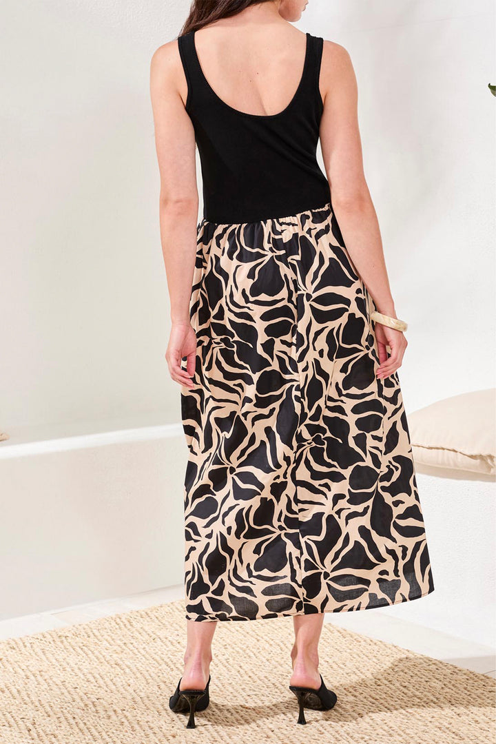 SLEEVELESS DRESS WITH FLORAL SKIRT