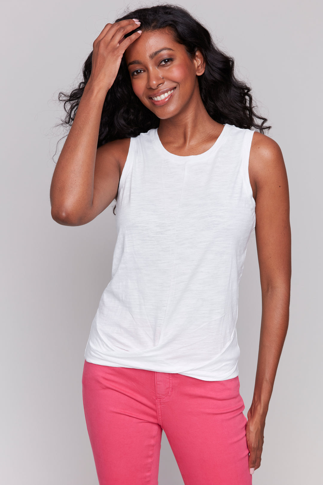 Charlie B Spring 2025 With a playful knot detail and back to basics style, this tank is perfect for keeping cool in the warmer months. Stay stylish and comfortable with a touch of quirky fun!