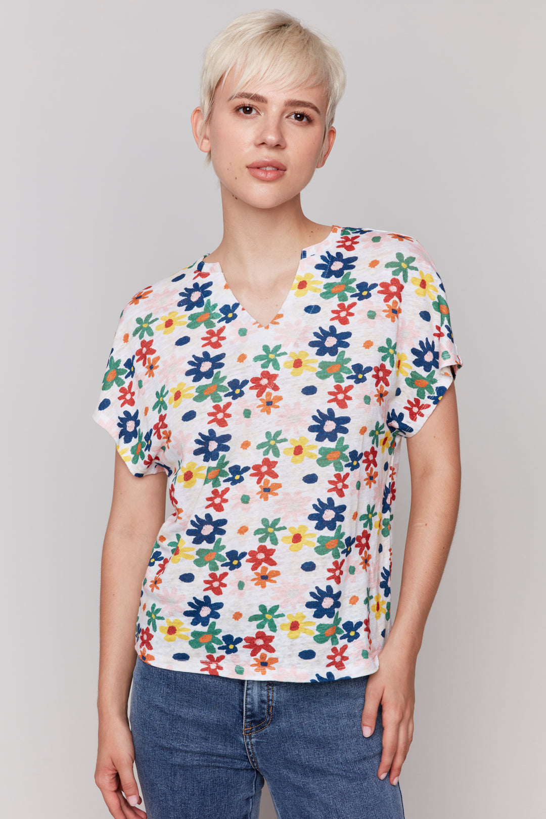 Charlie B Spring 2025  With a split neck and dolman short sleeves, it's perfect for pairing with shorts or jeans. 