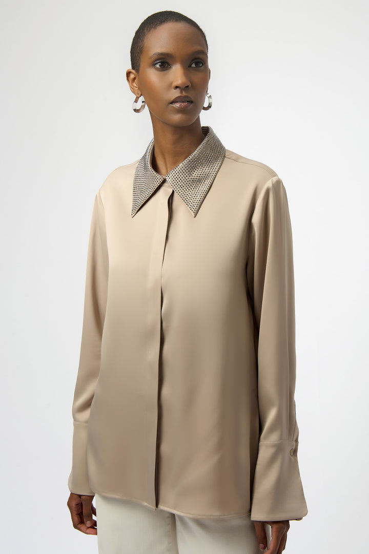 Joseph Ribkoff Fall 2025
Crafted from smooth, silky satin, it offers understated simplicity and a subtle shine that catches the light gracefully. The button-front design adds a refined touch, making it perfect for holidays or any elegant gathering.