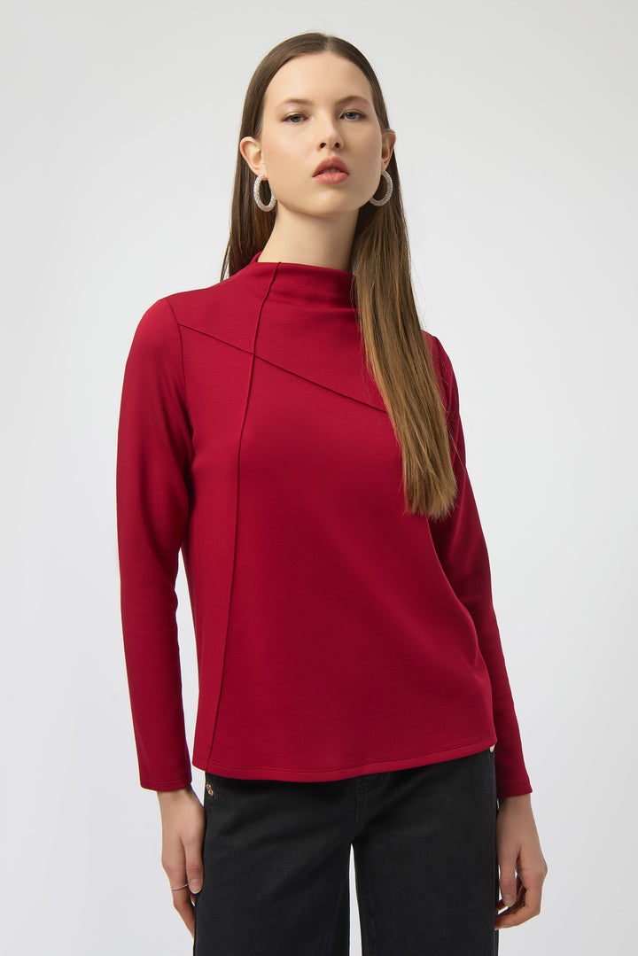Joseph Ribkoff Fall 2025 
Elevate your wardrobe with this LS Top featuring neat pintuck seams that add subtle, stylish texture. Designed with long sleeves and a light, unlined fabric, it offers effortless comfort whether you're at the office or out casually. 