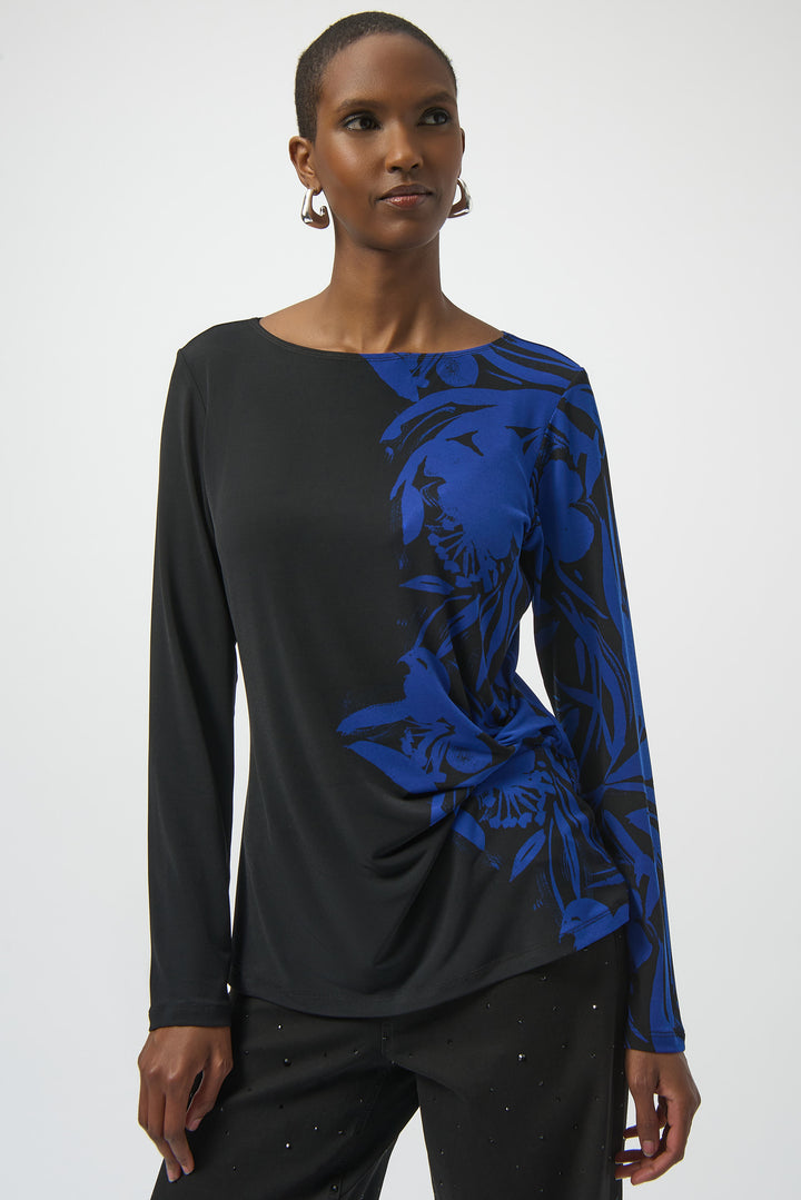 JOSEPH RIBKOFF Fall 2025 
Its elegant boat neckline and straight cut create a flattering silhouette, while the pinched side adds a subtle, stylish detail. The cool abstract floral print makes it a versatile statement piece that seamlessly adapts to any season.