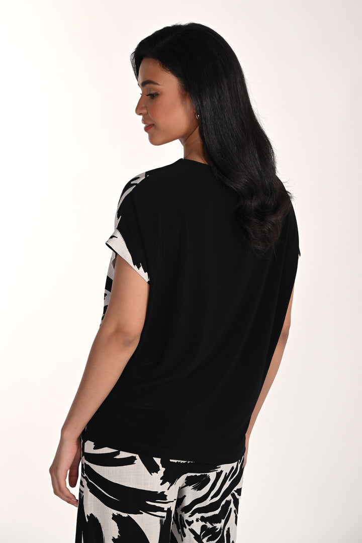 Black & white top on white background. 