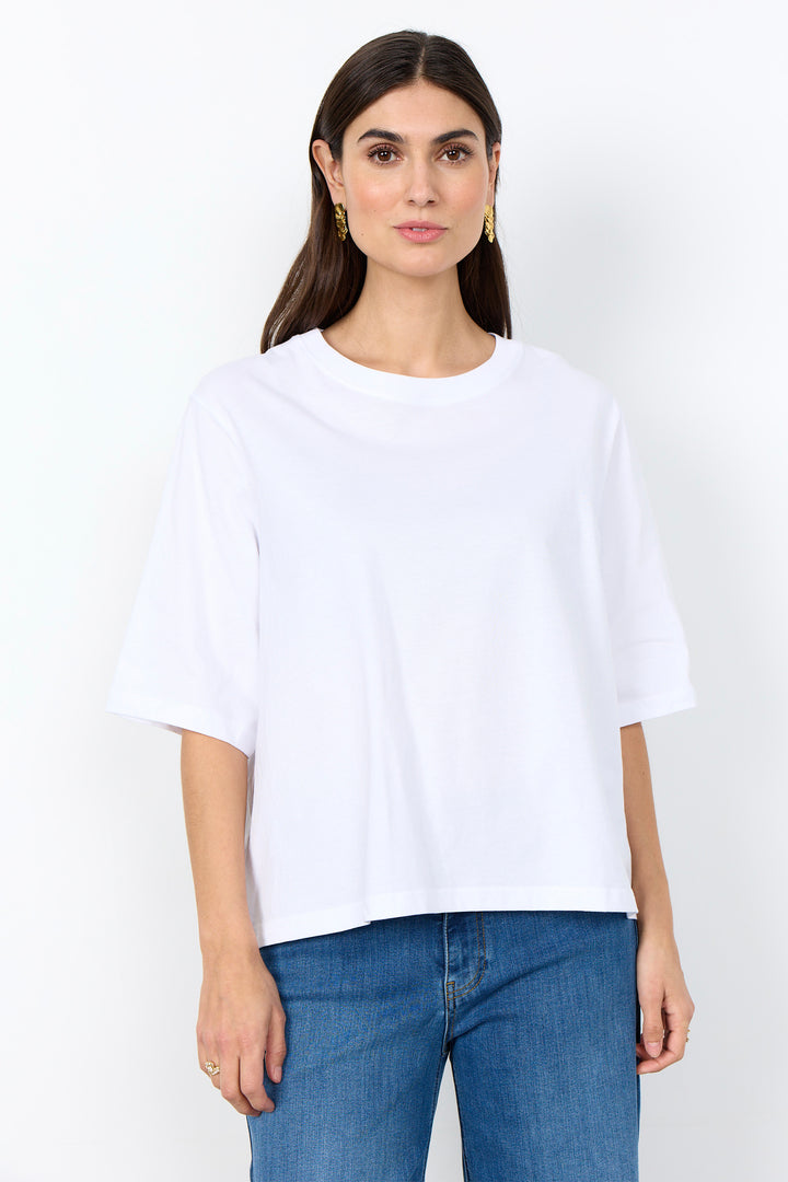 woman wearing half sleeve t-shirt on a white background. 