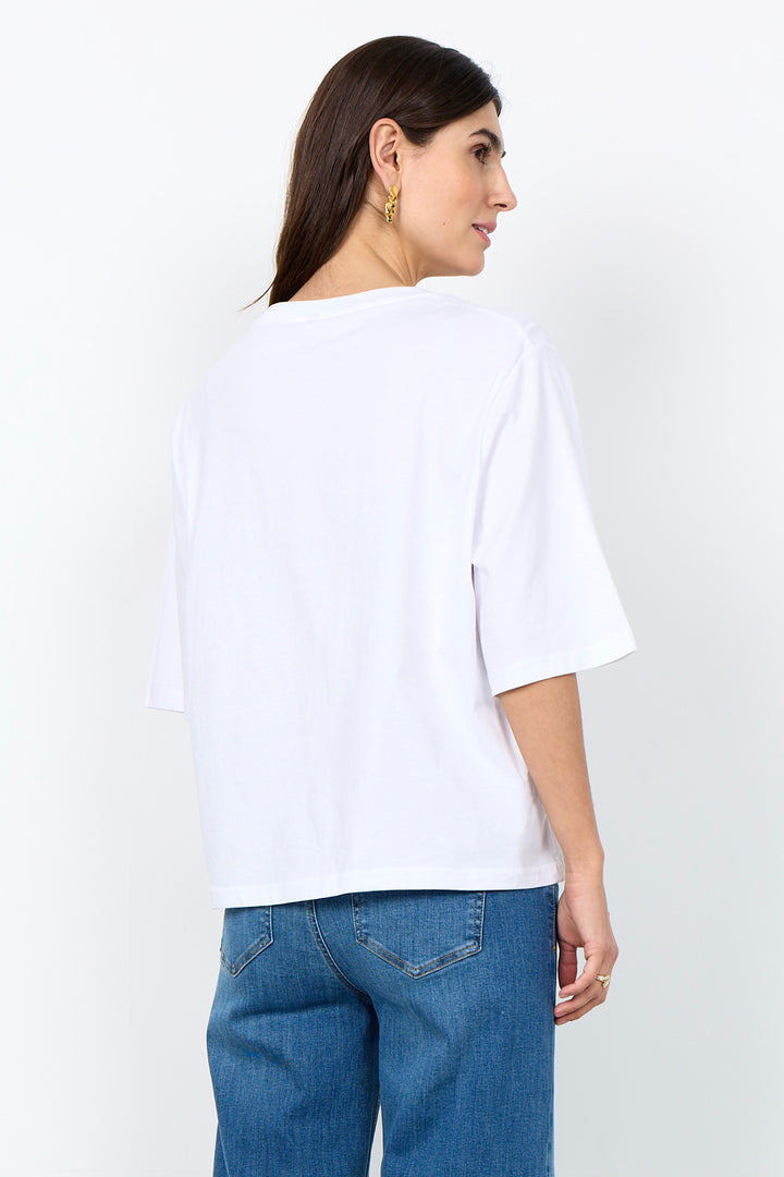 woman wearing half sleeve t-shirt on a white background. 