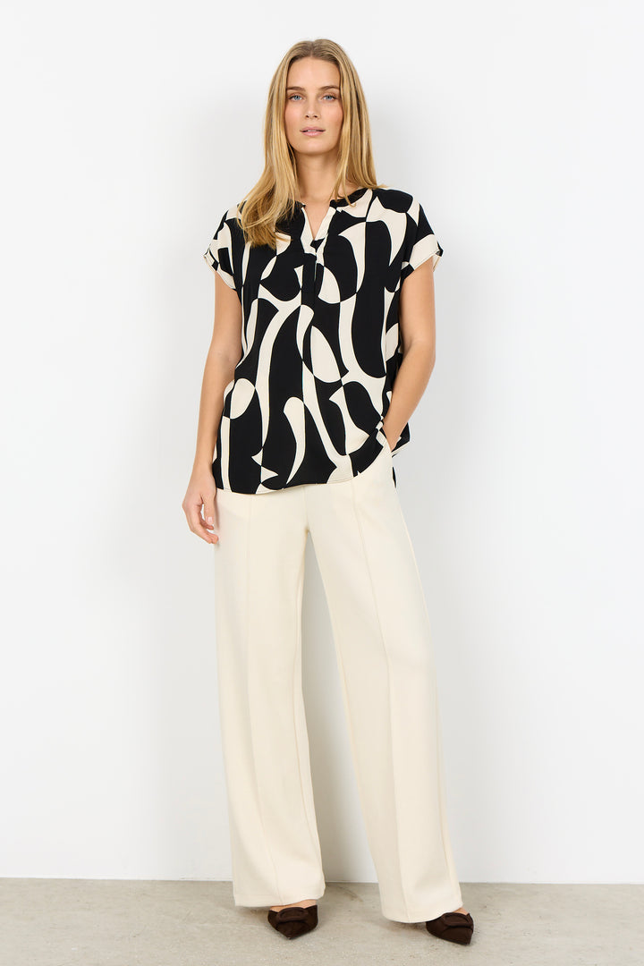ABSTRACT GEO SPLIT NECK TOP
