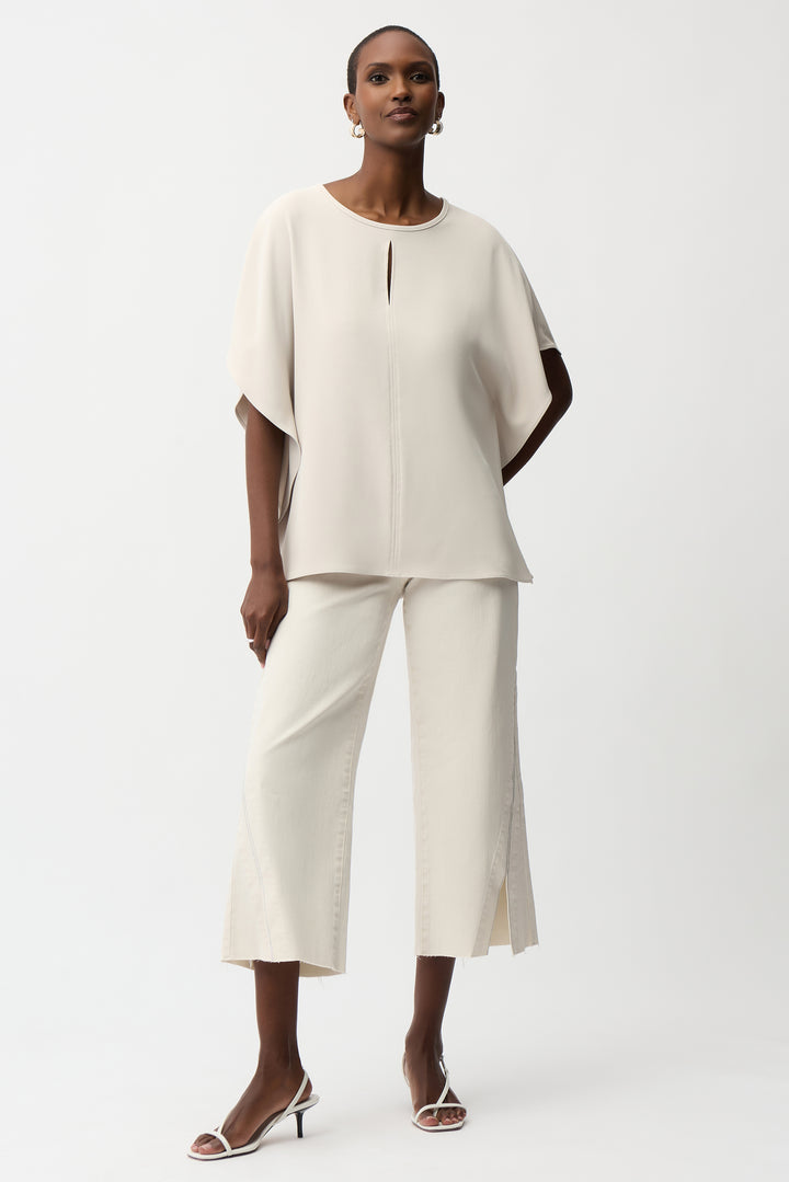 WOVEN TWILL KEYHOLE PONCHO TOP