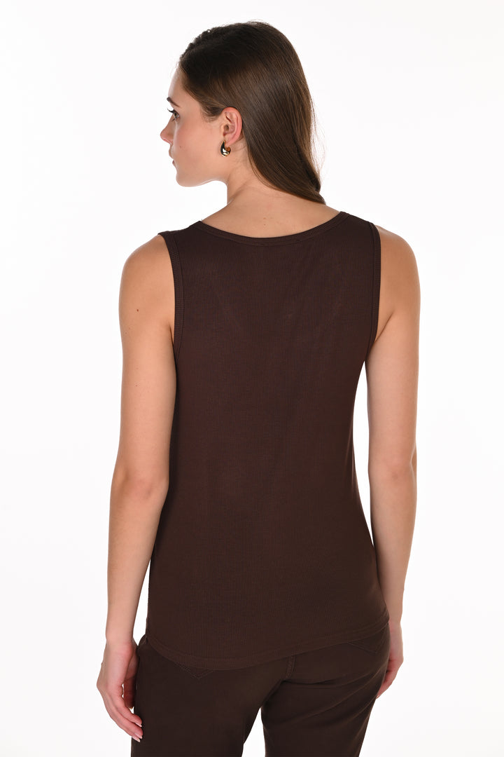 A woman shown from the back wearing a sleeveless dark brown top and matching dark brown bottoms against a plain white studio background.