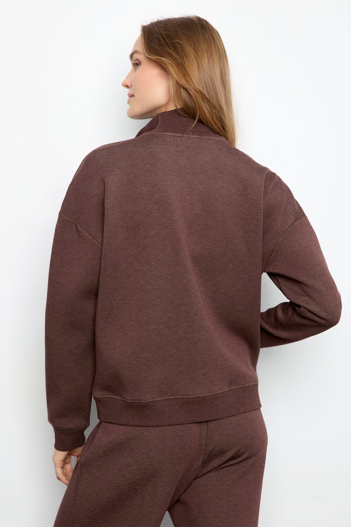 A woman shown from the back wearing a heathered brown long-sleeve sweatshirt and matching sweatpants against a plain white background.