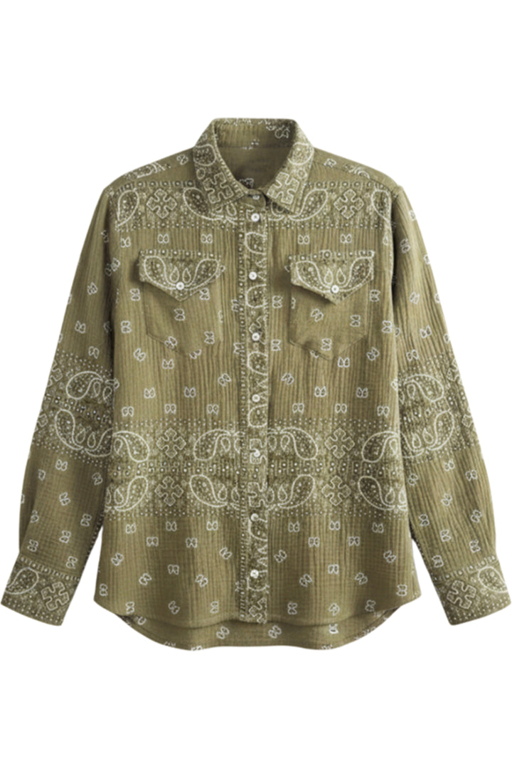 An olive green long-sleeve button-up shirt with a white paisley and geometric bandana print, featuring two chest flap pockets, shown against a plain white background.