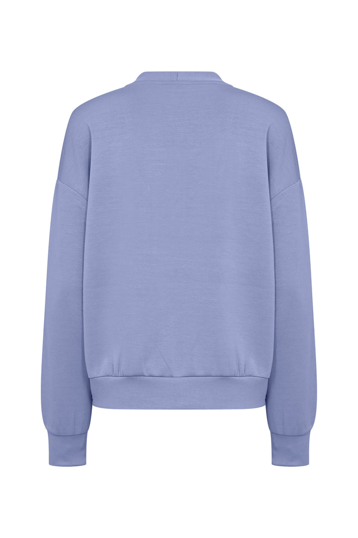 A light periwinkle blue crewneck sweatshirt shown from the back, featuring a ribbed collar, cuffs, and hem, displayed on a solid white background.