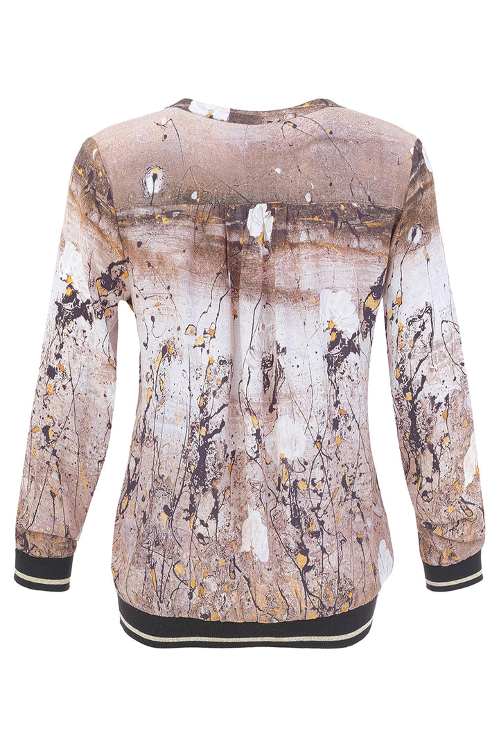 A long-sleeve crewneck sweatshirt featuring an abstract paint-splatter print in beige, brown, white, and black, with black ribbed cuffs and hem.