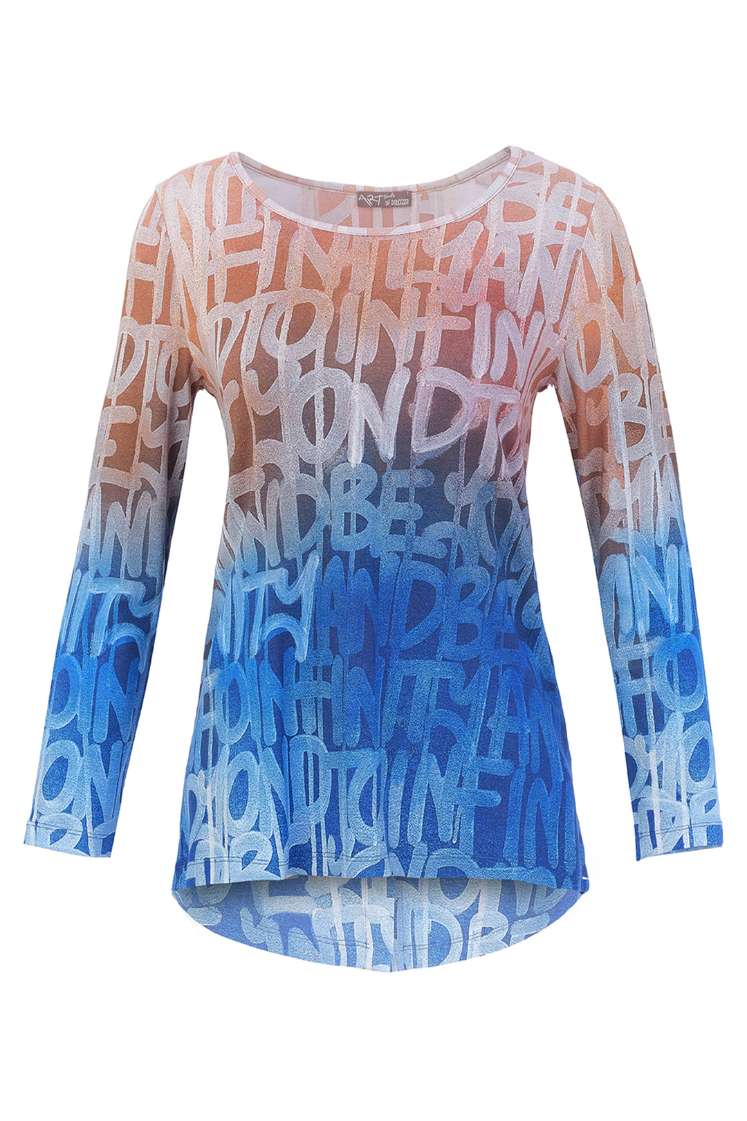 A women's long-sleeve top with a high-low hem, featuring a gradient color transition from peach-orange at the shoulders to light blue and medium blue at the hem. The fabric is covered in an all-over abstract graffiti-style pattern of white and light blue letters.