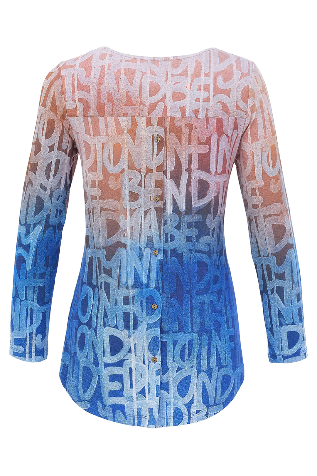 A top with an ombré gradient transitioning from peach-pink at the top to light blue and dark blue at the bottom, covered in a white graffiti-style text pattern, shown on a white background.