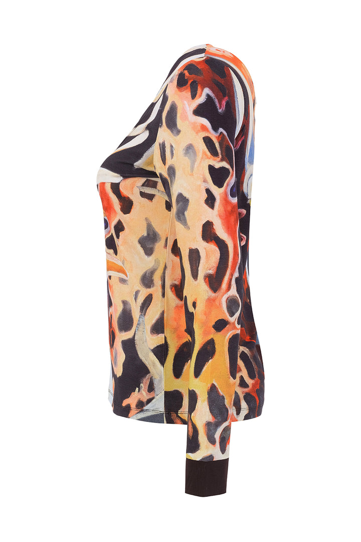 A long-sleeve top shown from the side on a white background, featuring an abstract, fluid organic pattern in orange, yellow, black, and cream.