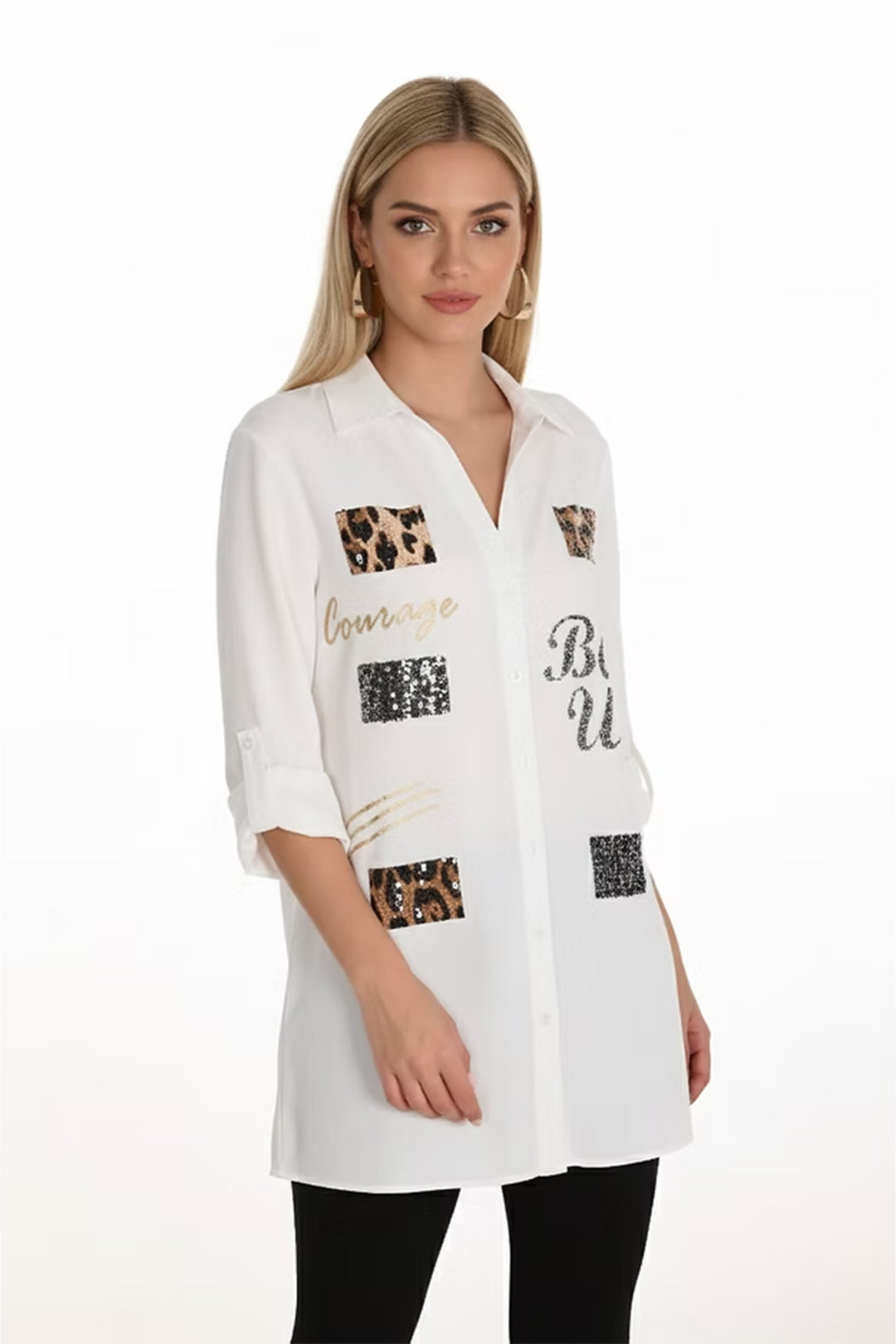 Woman wearing a white button shirt with decorative elements on a white background