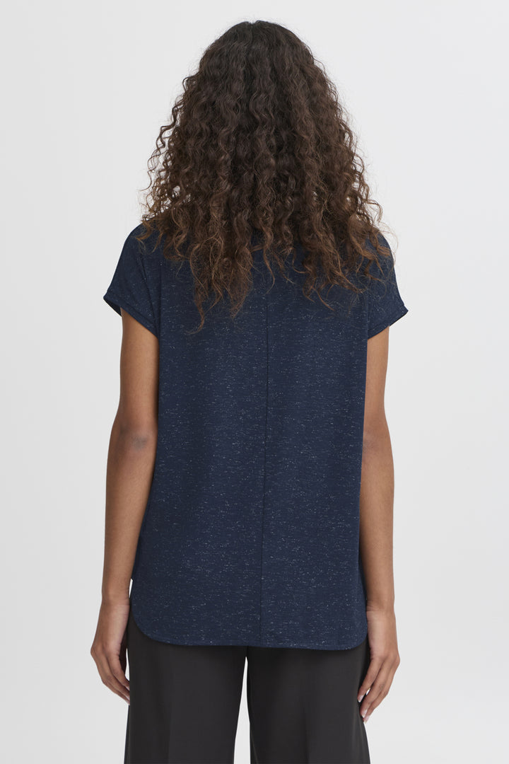 Person wearing a dark blue t-shirt on a white background