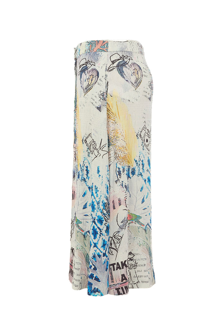 Long, patterned scarf with various designs on a white background
