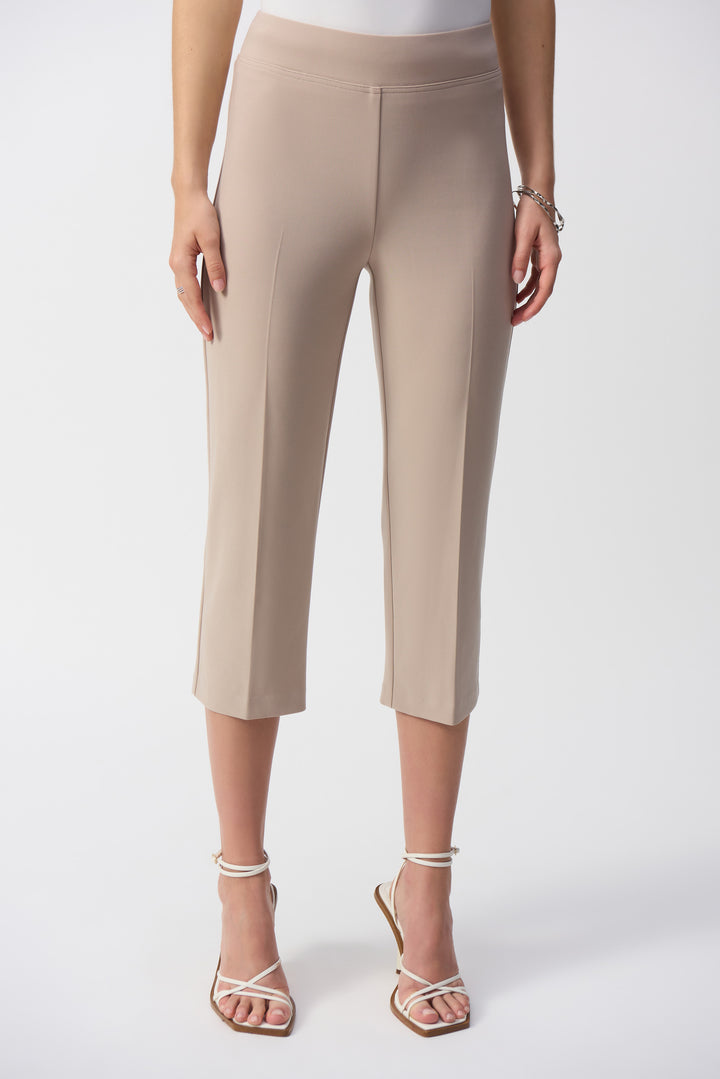 Joseph Ribkoff Spring 2025 The beauty of a capri pant is that it can keep you comfortable in a wide range of temperature fluctuations. Bottom slits add a charming flair and allow for adequate airflow.