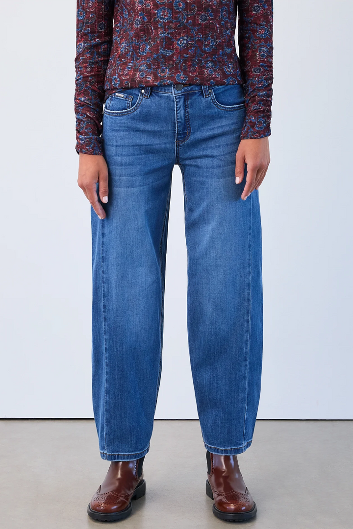 FDJ Fall 2025 
These medium wash girlfriend barrel jeans offer a soft feel with excellent stretch for all-day comfort for everyone. The slight narrowing at the ankle and loose barrel shape overall create a flattering silhouette that pairs effortlessly with your favourite sweater or casual top.