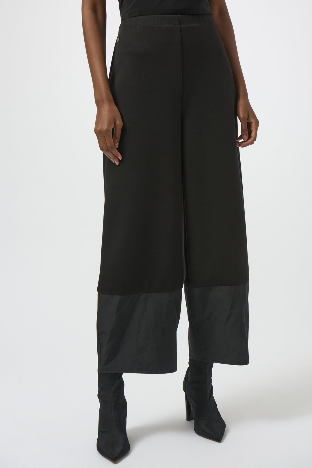 Joseph Ribkoff Fall 2025 
Ideal for pairing with a tailored blazer for formal occasions or styled casually for everyday office wear with a loose cowl neck sweater, they blend elegance with practicality to elevate your wardrobe.