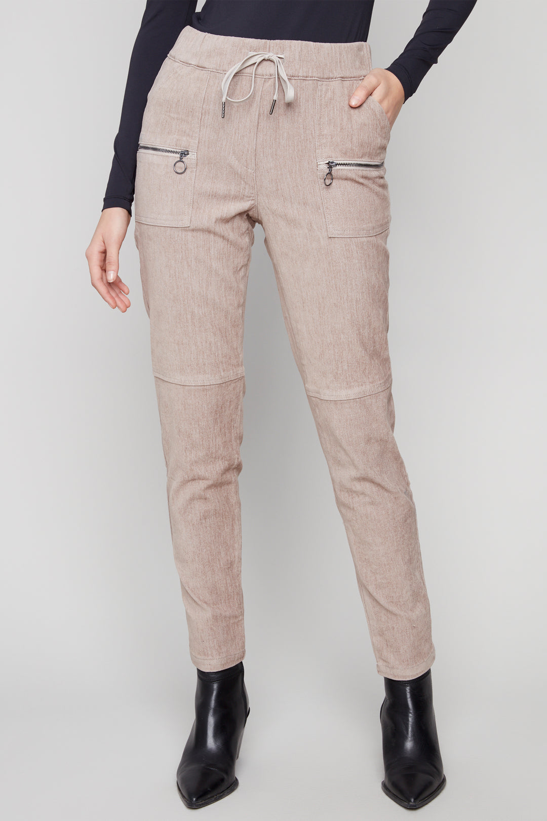 Charlie B Fall 2025 The popular jogger is back! Crafted with a pull-on design for easy wear and an elastic waistband with drawstring for a comfortable fit. Its flattering high-waisted silhouette accentuates your figure and the unique corduroy design print adds a touch of texture to any outfit.