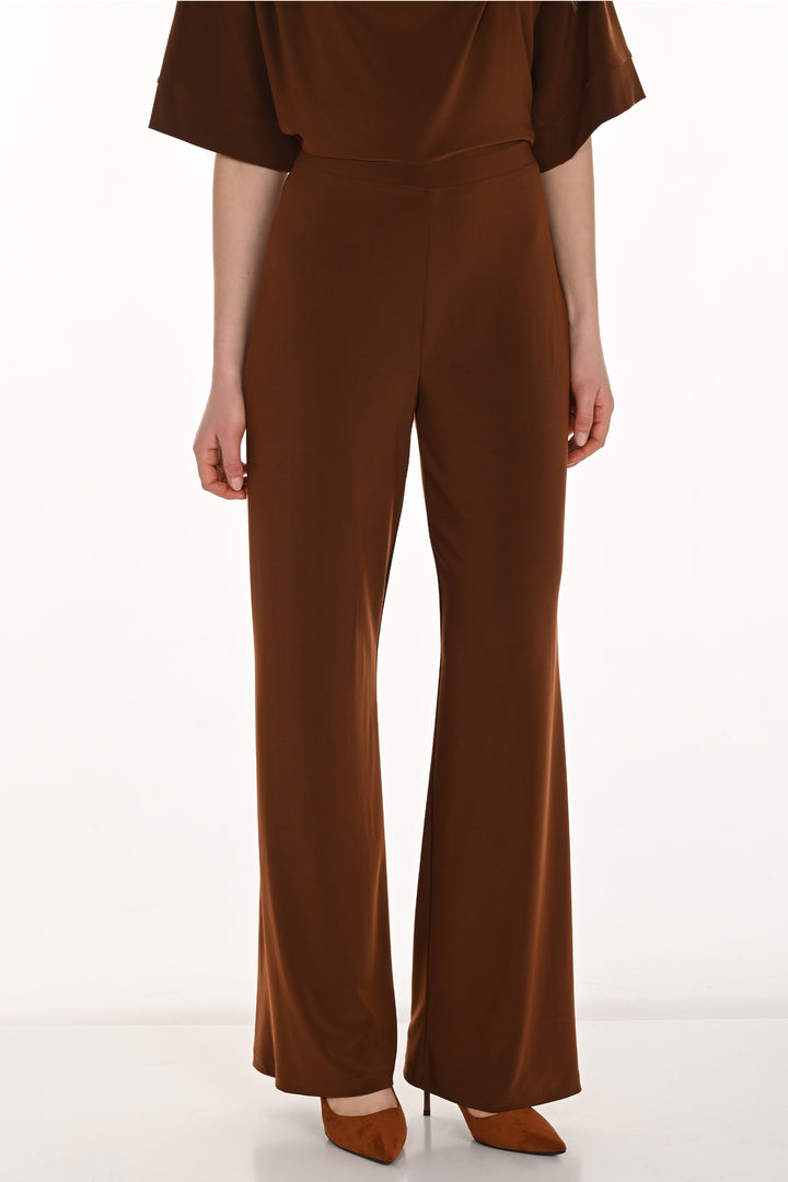 Frank Lyman Fall 2025 
Its versatile design transitions effortlessly from formal settings to casual outings, making it an essential piece in any wardrobe. Crafted with simplicity in mind, it exudes chic elegance without overwhelming your look.