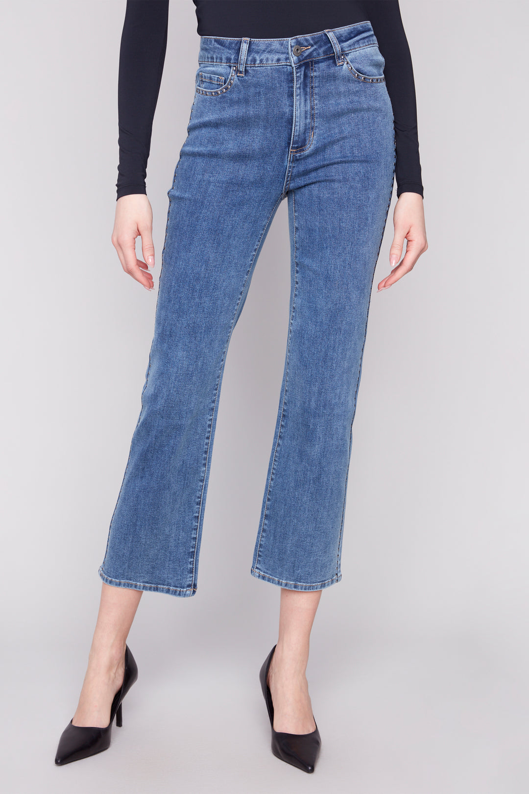 Charlie B Fall 2025 
Crafted from soft, lightweight denim, they feature a classic 5-pocket design for everyday practicality. Bling studs along the pockets and sides add a touch of sparkle, elevating your look effortlessly.