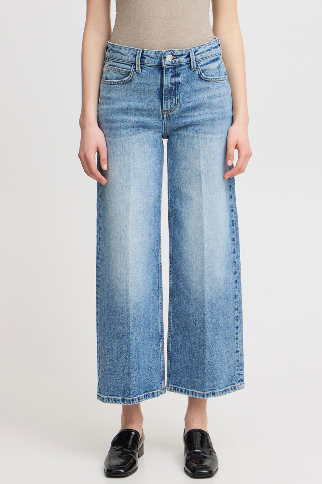 B. Young Fall 2025 
Experience comfort and style with these Wide Leg Jeans, designed for a relaxed fit from the high-rise waist to the ankle.