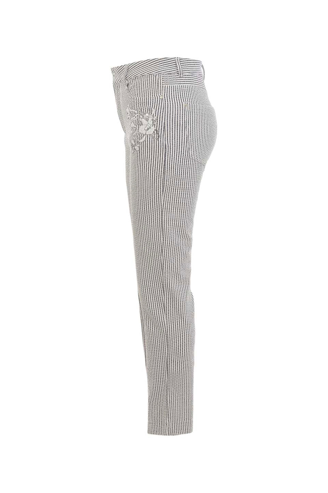 Black and white striped pants with floral embroidery on a white background