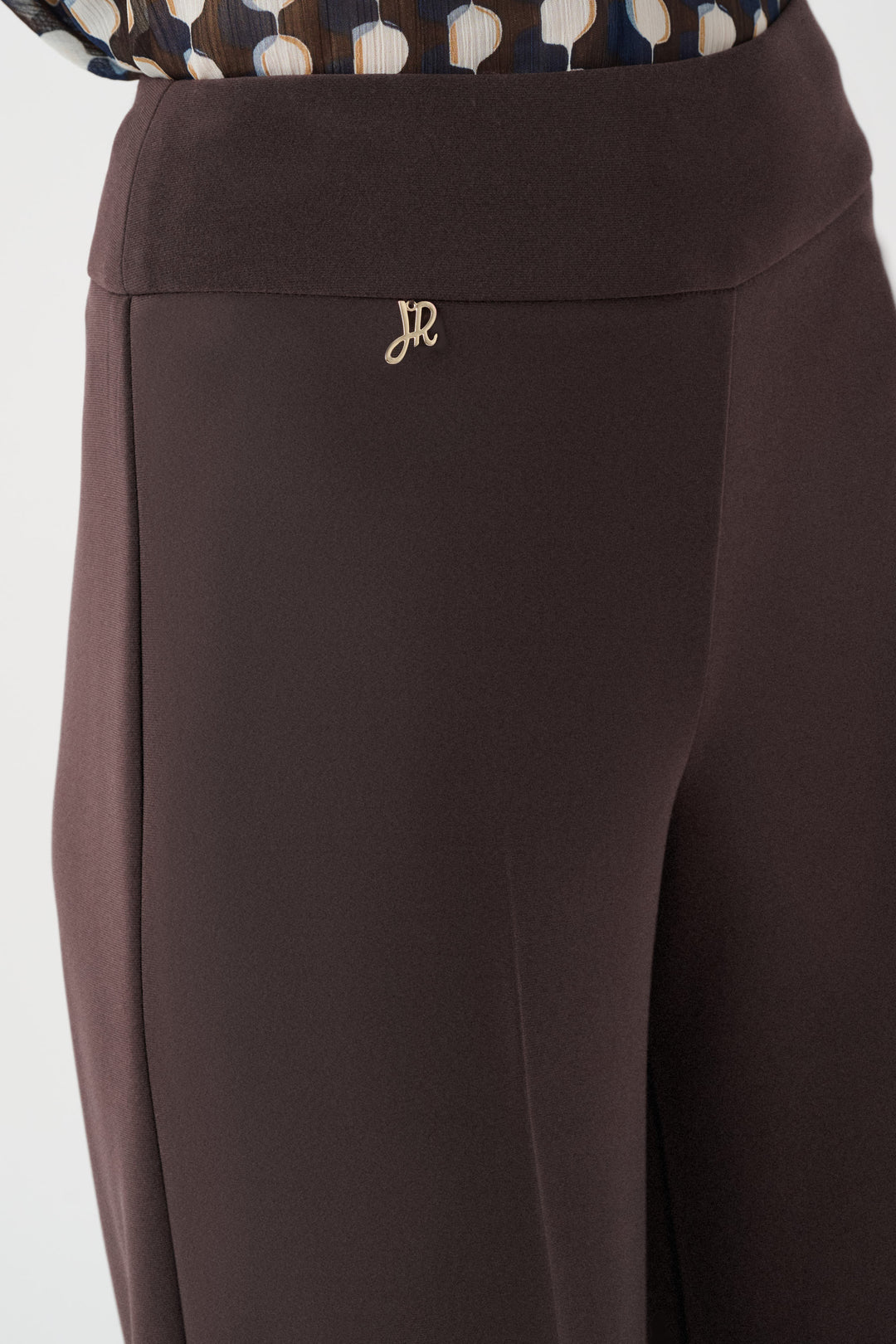 Brown pants with a logo on a white background