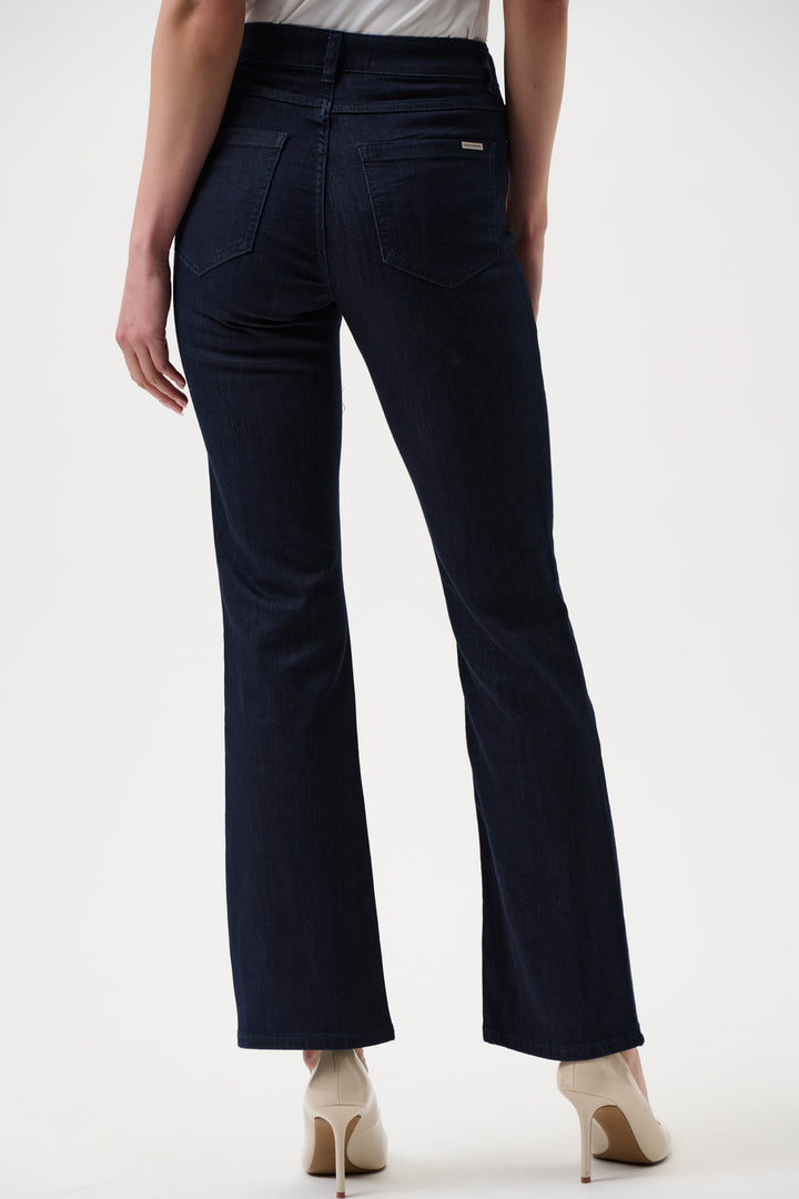 Navy blue pants worn by a person on a white background