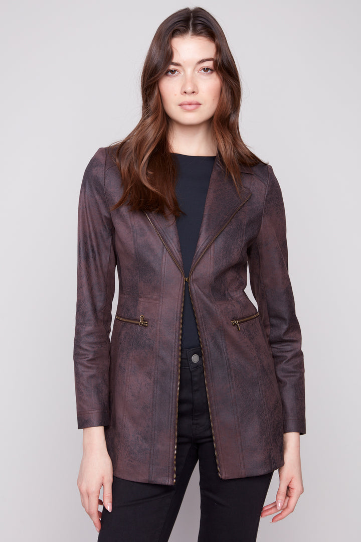 Charlie B Fall 2025 
This on-trend jacket boasts a wide lapel, faux leather fabric and edgy zipper details throughout. Our favourite way to style this jacket is with a button-up tunic shirt, leggings and ankle boots.