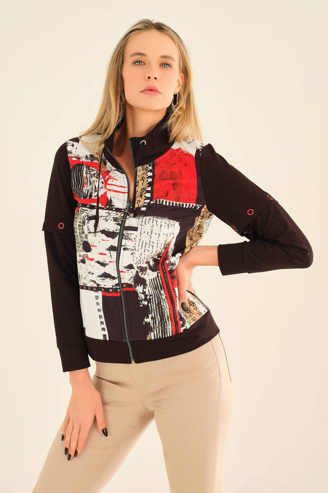 Dolcezza Fall 2025
Combining sporty style and comfort, the Bookworm Zip Jacket features a front zipper and high neck for a sleek, modern look. Its bold, straight full-length sleeves are accented with eyelet details, adding subtle flair. 