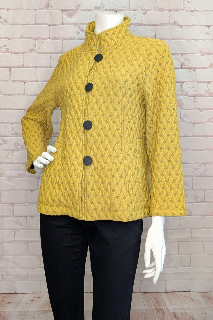 Dolcezza Fall 2025 
This Chartreuse Basketweave Jacket features four contrasting front buttons that add a neat, standout detail to its chic design. The basketweave pattern brings subtle texture and elegance, making it ideal for office wear or semi-formal occasions.