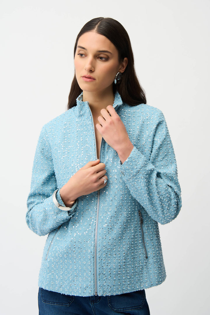 JOSEPH RIBKOFF Spring 2026 
Elevate your casual wardrobe with this striking denim zip jacket, crafted from eco-friendly cotton and adorned with shimmering sequins throughout. The standup high collar and front zipper create an edgy silhouette, while practical side pockets add everyday functionality.