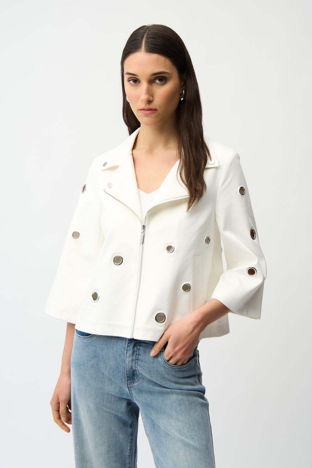 JOSEPH RIBKOFF Spring 2026 
Take your outfit to a whole new level with this leather style swing jacket! Featuring grommet cutouts, a classic notch lapel collar and chic foiled faux suede, this jacket offers an effortlessly stylish look with a more fitted overall fit for a modern contemporary touch.