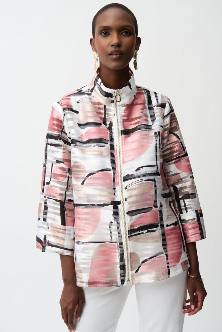 Woman wearing a colorful abstract-patterned jacket on a white background