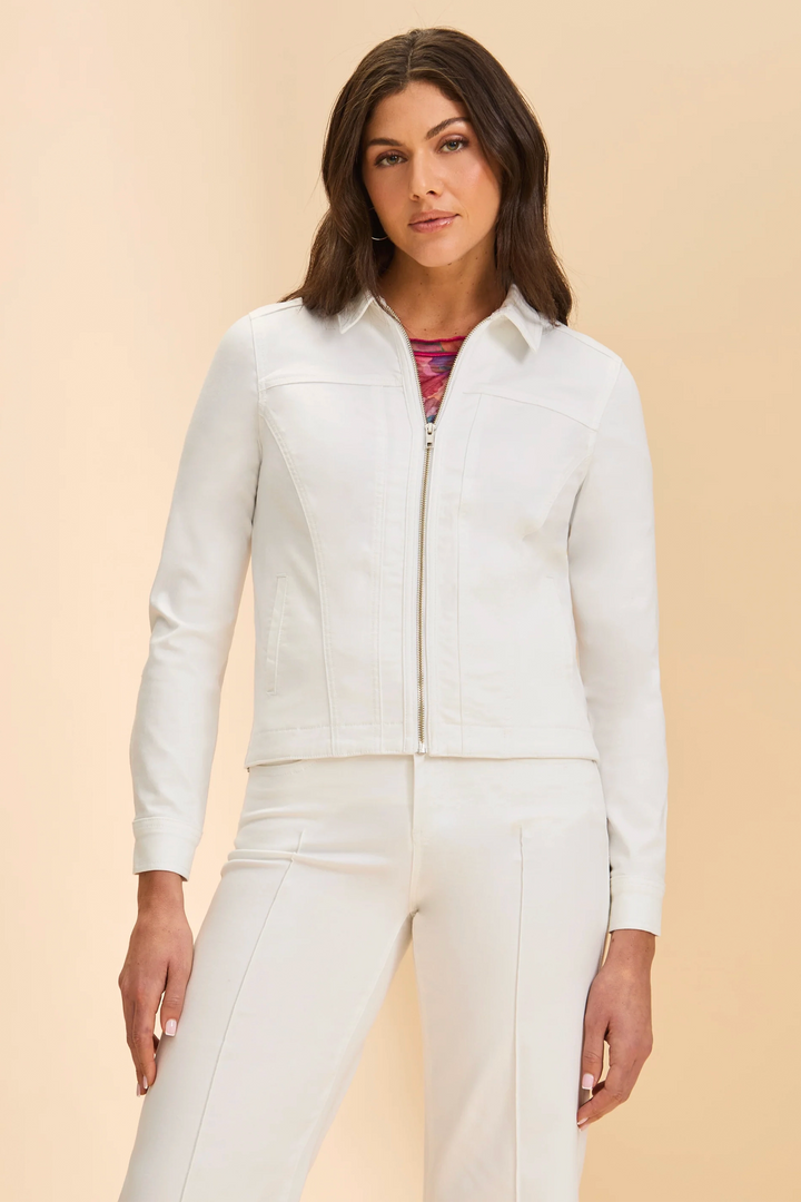 Woman wearing a white outfit on a beige background