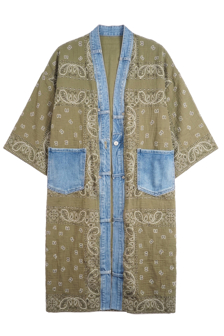 A lightweight open-front kimono-style cardigan featuring a sage green and light blue patchwork design with white paisley bandana prints, denim pockets, and button closures.