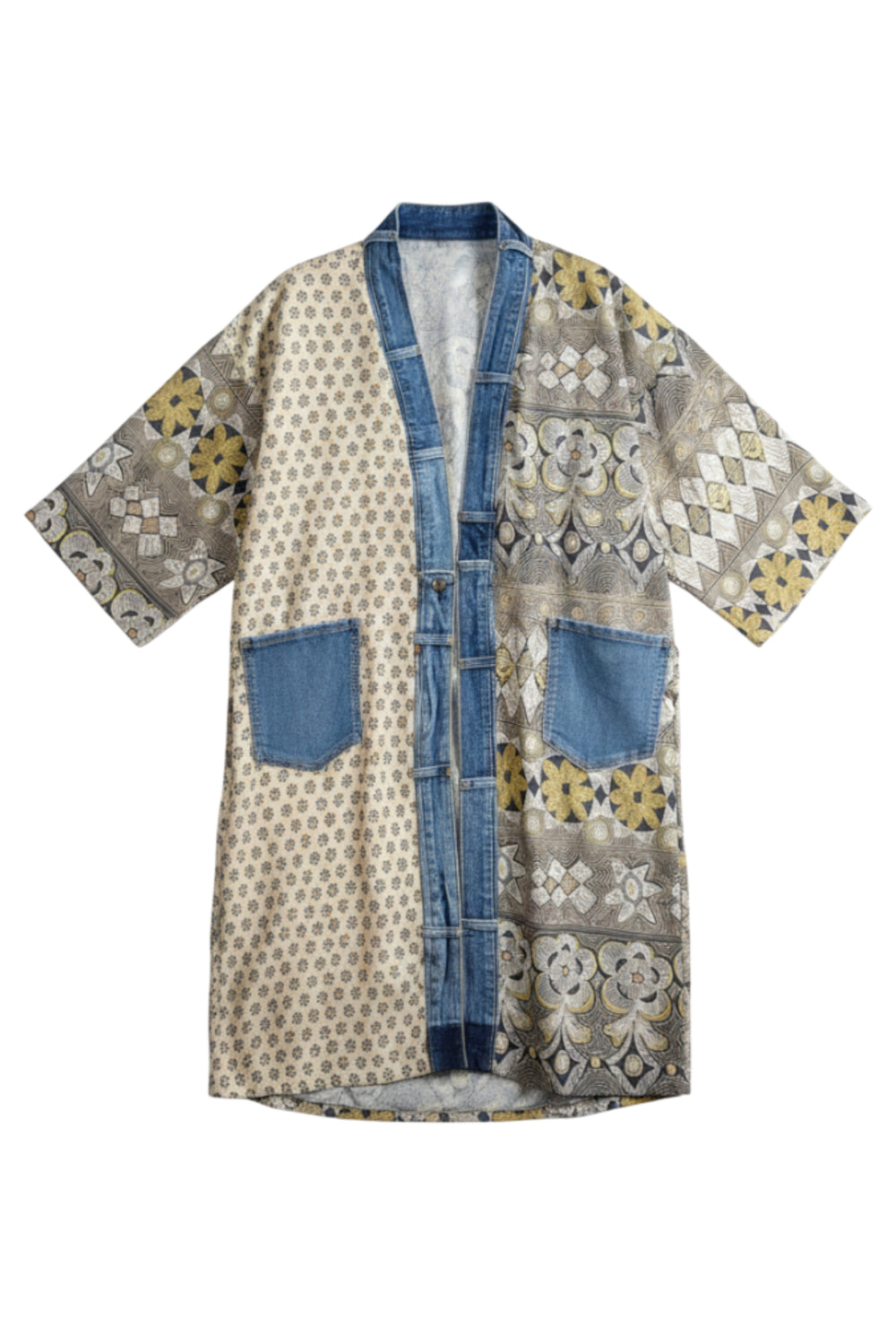A short-sleeved open-front kimono-style cardigan featuring a mixed pattern of beige geometric prints, blue denim-like trim and pockets, and yellow floral accents, shown against a plain white background.