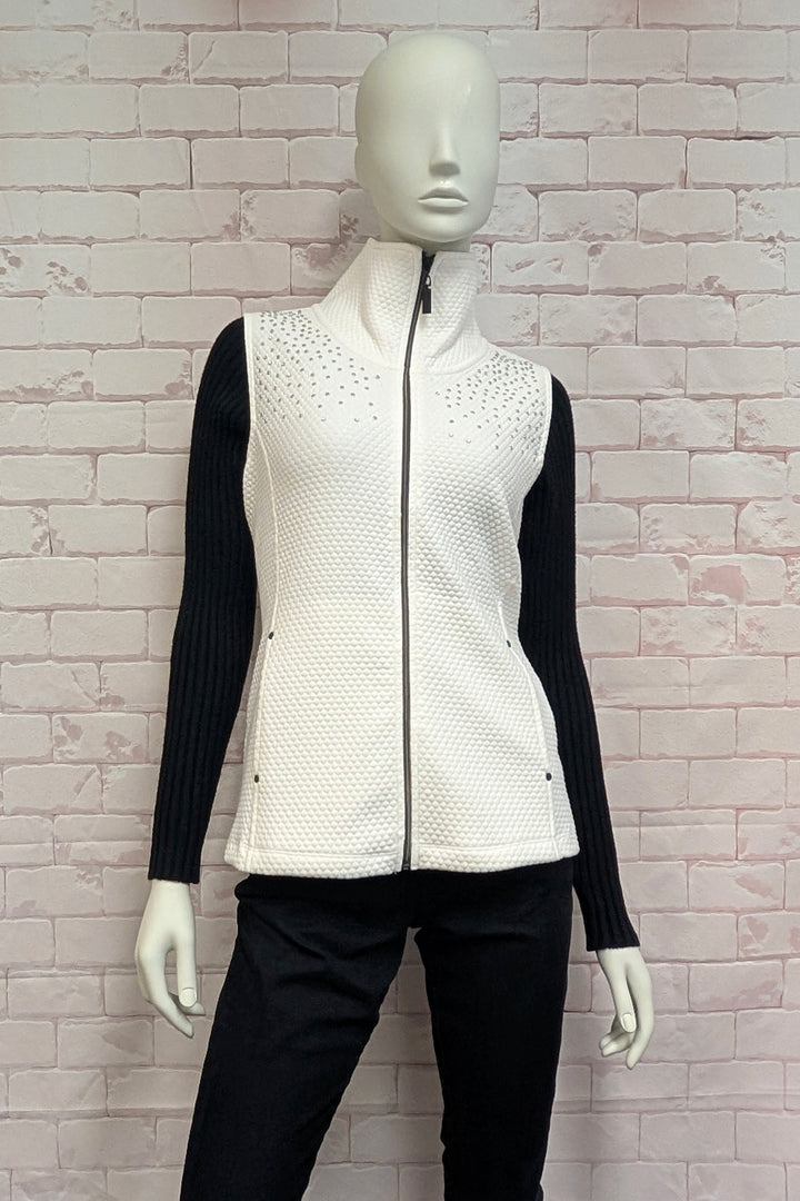 A mannequin wearing a white sleeveless vest with a high mock neck
