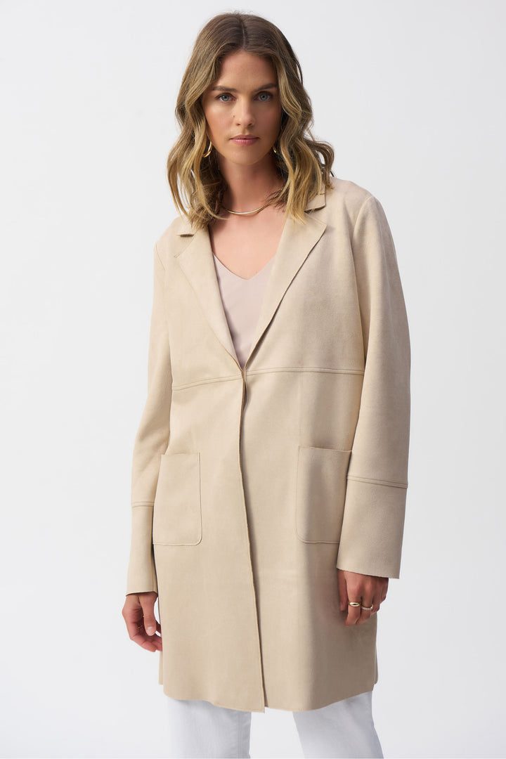 Joseph Ribkoff Summer 2025 This open style mid length overcoat features front pockets and a soft blend of fabrics for a light and loose feel.