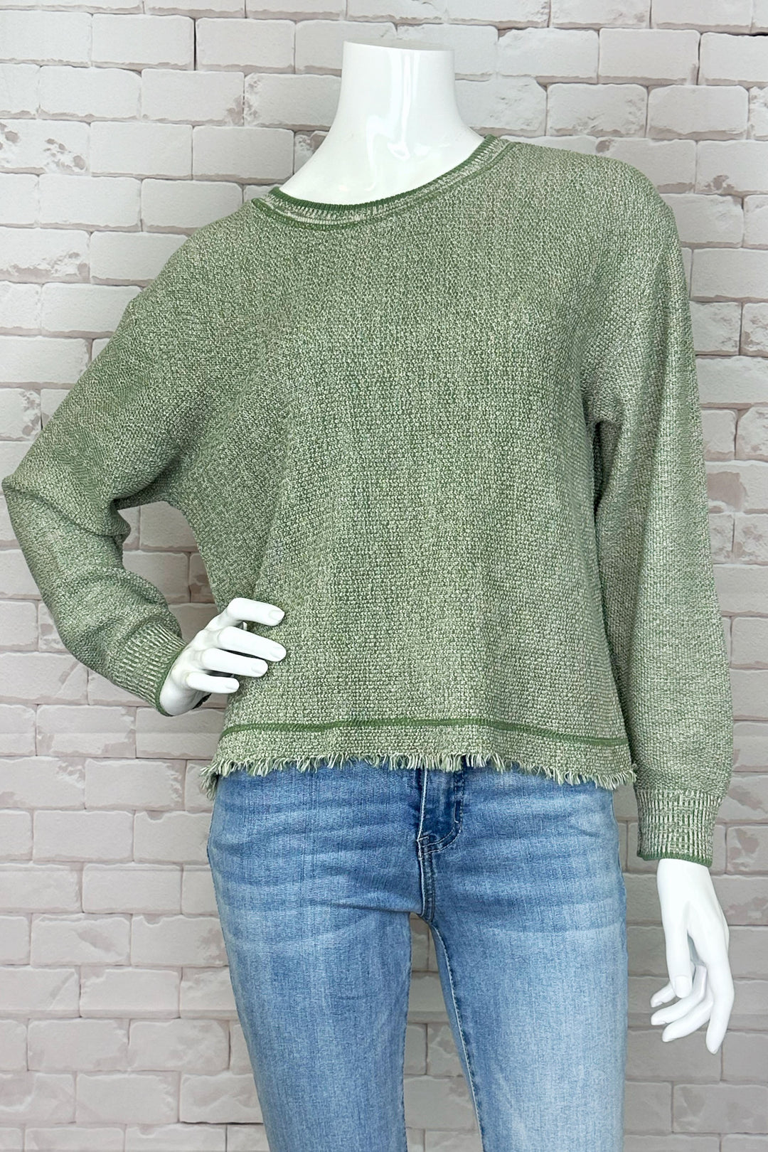 Made with a soft and lightweight knit fabric, this piece is perfect for any upcoming casual occasion. 