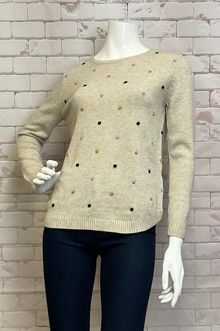 Parkhurst Fall 2024 t features a relaxed silhouette, long sleeves with ribbed cuffs and round neckline. The polka dot print is delightful and fun.