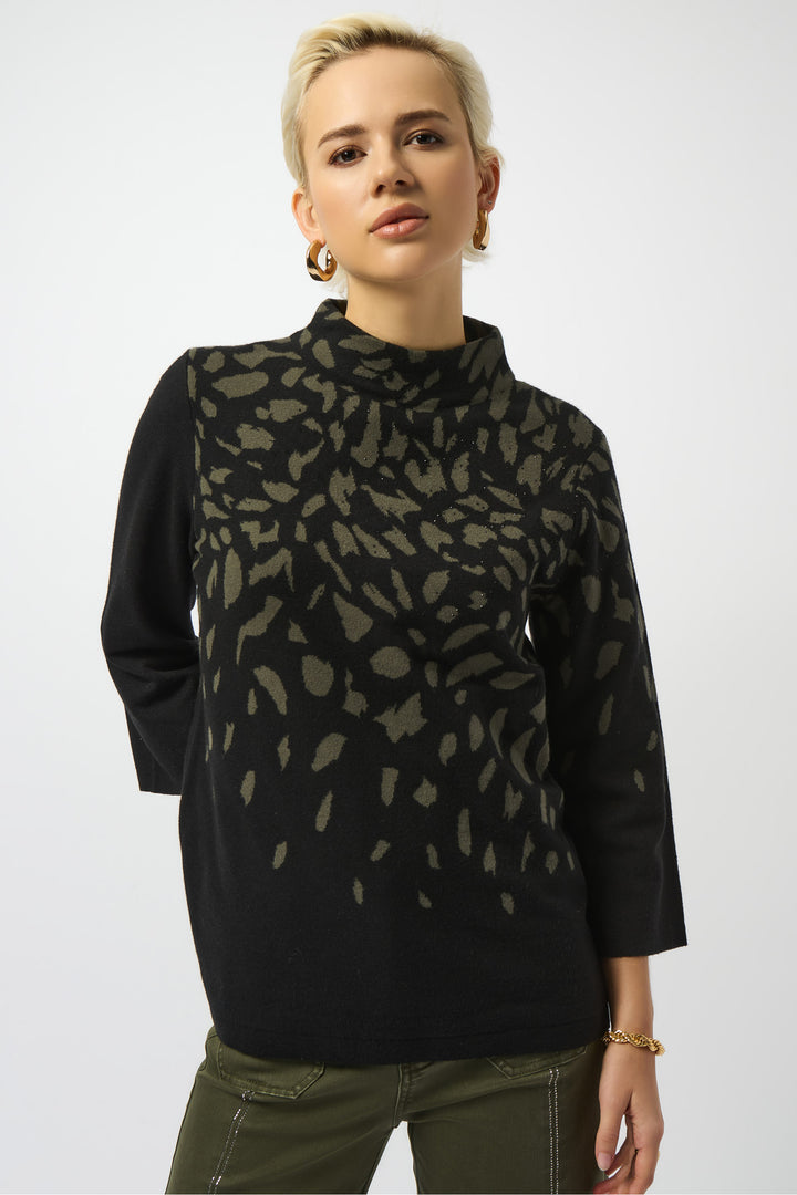 Joseph Ribkoff Fall 2025 
 Designed for a chic yet cozy feel, its loose fit ensures ultimate comfort throughout the day. Featuring a neat animal print and a stylish mock neck, this top pairs effortlessly with skirts or capris. 